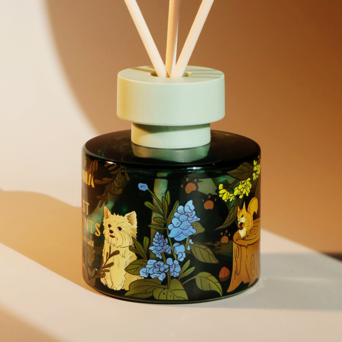 Close-up of the original hand-drawn artwork on a FUROMA reed diffuser bottle