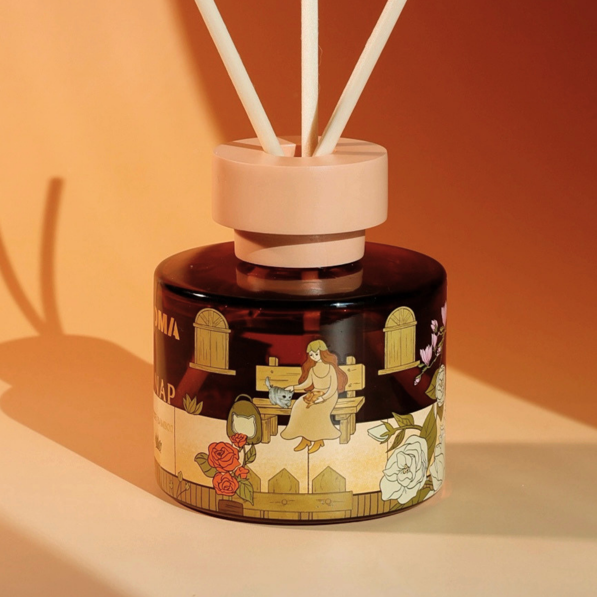 Close-up of the original hand-drawn artwork on a FUROMA reed diffuser bottle