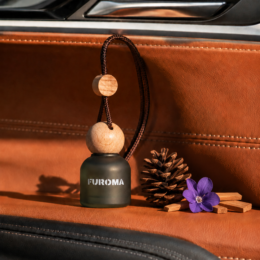 FUROMA  car air freshener on a car dashboard.